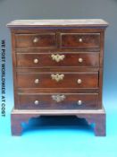 A 19thC mahogany apprentice chest of two over three graduated drawers,