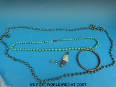 A beaded turquoise necklace, a Tibetan turquoise necklace and matching bangle,