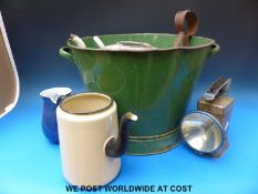 An enamel bucket,