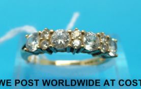 An 18ct gold ring set with cubic zirconia (size N)