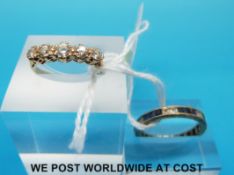 A 9ct gold ring set with paste and a 9ct gold ring set with alternating blue and clear stones