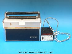A Zenith AII Transistor Trans-Oceanic radio together with a mains power supply unit