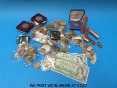 An amateur collection of UK and world coinage, includes silver content, Victorian half crown etc.