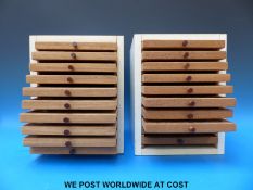 Two sets of coin collectors' chests,