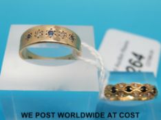 Two 9ct gold rings set with alternating diamonds and sapphires