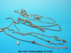 A 9ct gold signet ring, two 9ct gold chains and another yellow metal example (20.