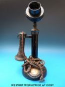 A bakelite candlestick telephone