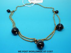A Victorian gilt necklace with five banded agate beads
