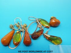 Two pairs of 14ct gold earrings set with transparent amber,