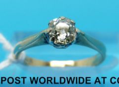 An 18ct gold ring set with an old cut diamond of approximately 0.