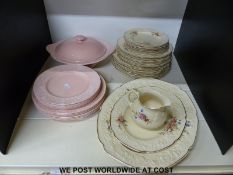 A collection of Clarice Cliff relief moulded plates and a tureen together with Crown Ducal plates,