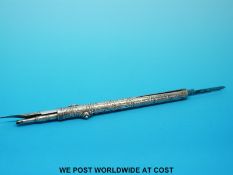 A triple use white metal propelling pen,