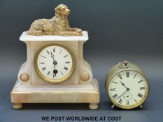 A 19thC alabaster clock with figural dog finial and a brass clock with subsidiary dial