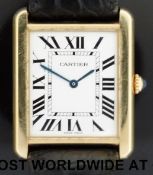 Cartier Tank Solo XL 18ct gold wristwatch with Roman numerals and blued hands on stainless steel