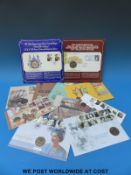 A collection of coin sets/stamps covers including Commonwealth games,