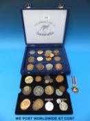 A box of various medallions