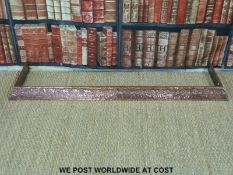 An Arts & Crafts copper fire fender (L131 x D36cm)