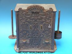 A Victorian Garretts 'Bijon gold charger' of cast iron construction and Art Nouveau design with key.