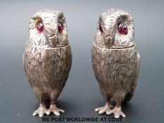 A pair of hallmarked silver novelty owl peperettes with screw on heads, height 6cm,