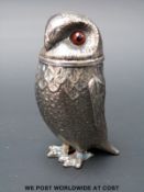 A novelty peperette formed as an owl with screw on head,