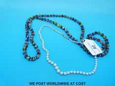 A millefiori glass beaded necklace and a single strand of pearls with a 9ct gold clasp