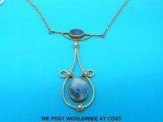 An Edwardian 9ct gold necklace set with two opal doublets and seed pearls