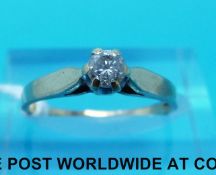 A 9ct gold ring set with a round brilliant cut diamond (size L)