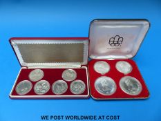A cased set of four silver Montreal Olympics 1972 medal coins comprising two, ten dollar and two,