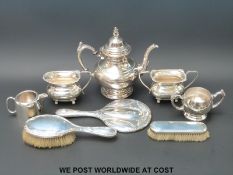 A hallmarked silver Arts and Crafts hand mirror,