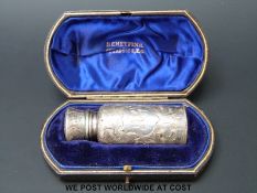 A cased Victorian hallmarked silver scent bottle,