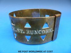 A Georgian/Victorian heavy pierced brass dog collar with two slot and loop adjustment and engraved