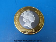 A cased Queen's Golden Jubilee 1kg silver Alderney £50 giant medallion coin 2002