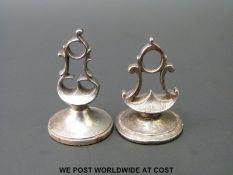 Two late 18thC cut steel armorial fobs, tallest 3.