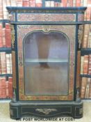 A 19thC Boulle work ebonised pier cabinet with ormolu mounts, surround,