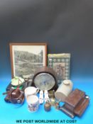 A Smiths Enfield mantel clock, an oak inkwell, a vintage Kodak camera, commemorative mugs,