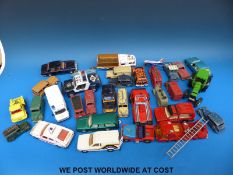 A quantity of Dinky & Corgi die cast model vehicles.