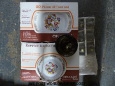 Two boxed 20 piece dinner services and a boxed set of glasses
