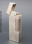 A silver hallmarked Dunhill Rollagas lighter London 1993 and stamped 925 to base