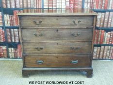 A Georgian mahogany chest of four graduated drawers raised on bracket feet (H101 x W110 x D53cm)
