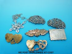 Two 9ct gold Mizpah brooches with two hallmarked silver Mizpah brooches and two cut steel examples