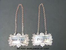 Two Victorian hallmarked silver sherry and port labels with pierced lettering, London 1843,