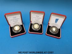 Three cased silver proof Piedfort 50p coins, two for 1997,