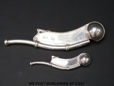 A 19th century hallmarked silver bosuns whistle, marks rubbed,