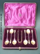A cased set of Victorian hallmarked silver apostle spoons and tongs B'ham 1898 maker George Unite