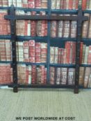 A late 19thC/early 20thC oak framed stick rack (H103 x W91cm)