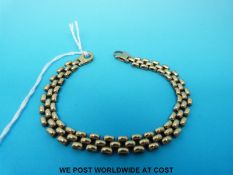 A 9ct gold bracelet (14.