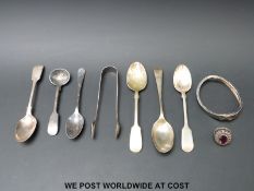 A hallmarked silver spoon, a Victorian silver and gold ring set with an amethyst and marcasite,