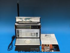 A Zenith Trans-Oceanic Royal 7000-1 radio with original paperwork