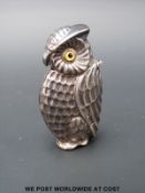 A hallmarked silver vesta case in the form of an owl,