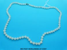 An early jadeite necklace made up of graduated spherical beads